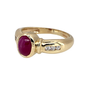 Preowned 9ct Yellow Gold Ruby & Cubic Zirconia Cabochon Set Ring in size L with the weight 3.40 grams. The ruby stone is 6mm by 5mm