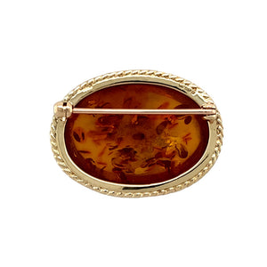Preowned 9ct Yellow Gold & Amber Oval Brooch with the weight 4.20 grams. The amber stone is approximately 2.5cm by 1.9cm