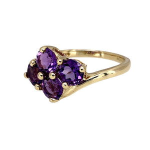 Preowned 9ct Yellow Gold & Amethyst Set Cluster Ring in size L with the weight 2.60 grams. The amethyst stones are each 5mm diameter