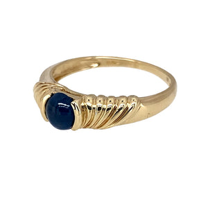 Preowned 9ct Yellow Gold & Sapphire Cabochon Set Ring in size N with the weight 2.30 grams. The sapphire stone is 5mm diameter