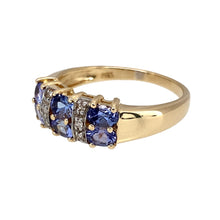 Load image into Gallery viewer, Preowned 9ct Yellow and White Gold Diamond &amp; Tanzanite Set Band Ring in size P with the weight 2.80 grams. The front of the band is 6mm high and the tanzanite stones are each approximately 4mm by 3mm
