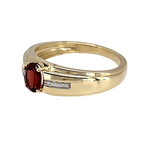 Preowned 9ct Yellow Gold Diamond & Garnet Set Ring in size V with the weight 4.70 grams. The garnet stone is 7mm by 5mm