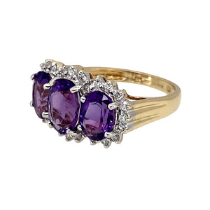 Preowned 9ct Yellow and White Gold Diamond & Amethyst Set Trilogy Cluster Ring in size J with the weight 3.10 grams. The center amethyst stone is 8mm by 6mm and the side amethyst stones are each 7mm by 5mm