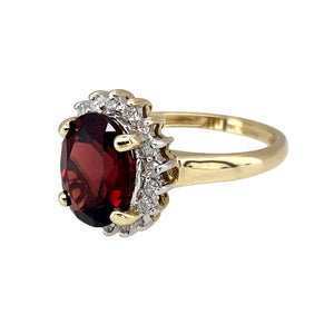 Preowned 9ct Yellow and White Gold Diamond & Garnet Set Cluster Ring in size L with the weight 3 grams. The garnet stone is 10mm by 8mm
