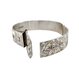 Preowned 925 Solid Silver Engraved Patterned Buckle Bangle with the weight 47.50 grams. The front of the buckle is 2.4cm wide and the bangle diameter is 6.5cm