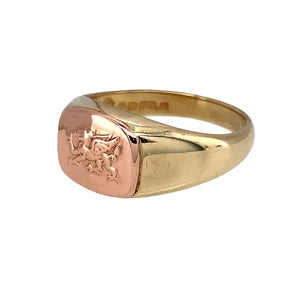 Preowned 9ct Yellow and Rose Gold Clogau Welsh Dragon Signet Ring in size O with the weight 5.50 grams. The front of the ring is 10mm high