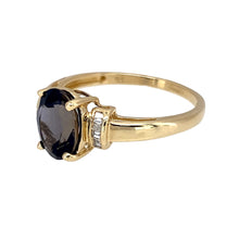 Load image into Gallery viewer, Preowned 9ct Yellow Gold Diamond &amp; Dark Navy Blue/Purple Stone Set Ring in size P with the weight 1.90 grams. The stone is 9mm by 7mm
