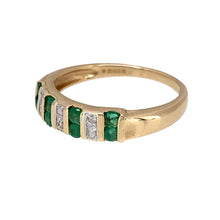 Load image into Gallery viewer, Preowned 9ct Yellow and White Gold Diamond &amp; Emerald Set Band Ring in size L with the weight 1.90 grams. The front of the band is 4mm wide
