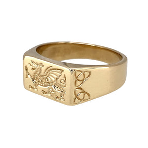 Preowned 9ct Yellow Gold Welsh Dragon Signet Ring in size U with the weight 8.60 grams. The front of the ring is 9mm high and there is a celtic knot on the sides of the ring