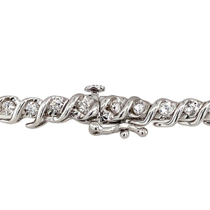 Preowned 9ct White Gold & Diamond Set 7.25" Bracelet with the weight 11.10 grams and link width 5mm. There is approximately 1.26ct - 1.68ct of diamond content with approximate clarity i1 and colour J - K