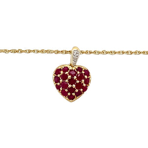 Preowned 9ct Yellow and White Gold Diamond & Ruby Set Heart Pendant on an 18" Prince of Wales chain with the weight 3.20 grams. The pendant is 1.8cm long including the bail