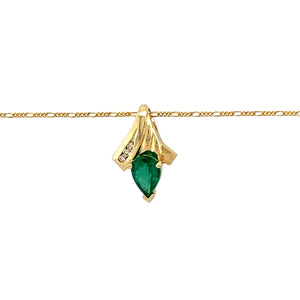 Preowned 14ct Yellow Gold Diamond & Emerald Set Pendant on an 18" fine Figaro chain with the weight 2.60 grams. The pendant is 1.7cm long and the emerald stone is 7mm by 5mm