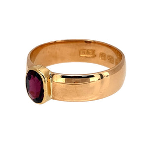 Preowned 22ct Yellow Gold & Pink Tourmaline Set Band Ring in size O with the weight 5.90 grams. The pink tourmaline stone is 7mm by 5mm