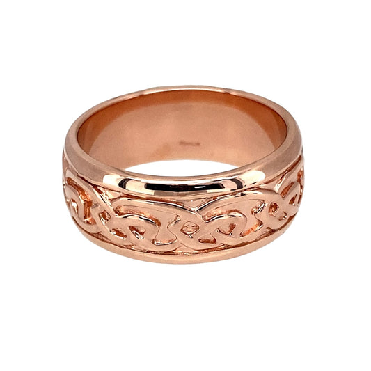 Bring heritage charm and symbolic elegance to your collection with this pre-owned Clogau Annwyl Celtic knot band ring in 9ct rose gold—a meaningful design inspired by Welsh tradition.

Design: The ring features an 8mm wide band decorated with an intricate Celtic knot pattern, symbolising eternity, unity, and interconnectedness.
Material: Made from 9-carat rose gold, the polished finish highlights the warm blush tones and enhances the detailed knotwork.