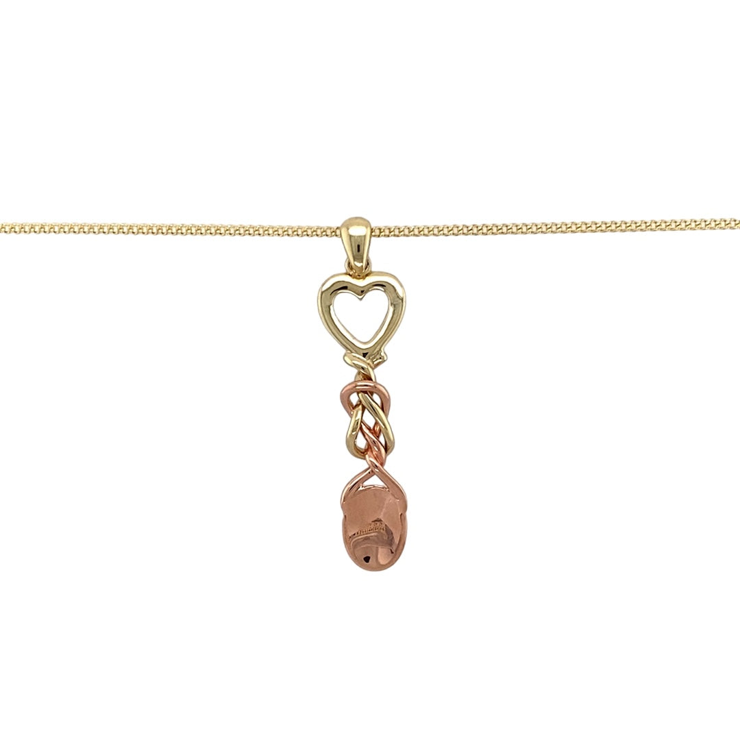 Bring heritage charm and meaningful design to your collection with this pre-owned 9ct yellow and rose gold Clogau lovespoon pendant on an 18" curb chain—a traditional symbol of love and affection.

Design: The pendant measures 4.4cm long including the bail and is styled as a classic Welsh lovespoon, beautifully detailed for a distinctive look.
Material: Made from 9-carat yellow and rose gold, the polished finish enhances the contrast of tones and highlights the craftsmanship of the design.