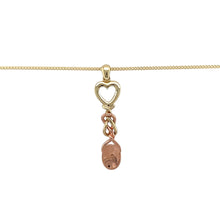 Load image into Gallery viewer, Bring heritage charm and meaningful design to your collection with this pre-owned 9ct yellow and rose gold Clogau lovespoon pendant on an 18&quot; curb chain—a traditional symbol of love and affection.

Design: The pendant measures 4.4cm long including the bail and is styled as a classic Welsh lovespoon, beautifully detailed for a distinctive look.
Material: Made from 9-carat yellow and rose gold, the polished finish enhances the contrast of tones and highlights the craftsmanship of the design.

