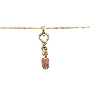 Bring heritage charm and meaningful design to your collection with this pre-owned 9ct yellow and rose gold Clogau lovespoon pendant on an 18" curb chain—a traditional symbol of love and affection.

Design: The pendant measures 4.4cm long including the bail and is styled as a classic Welsh lovespoon, beautifully detailed for a distinctive look.
Material: Made from 9-carat yellow and rose gold, the polished finish enhances the contrast of tones and highlights the craftsmanship of the design.