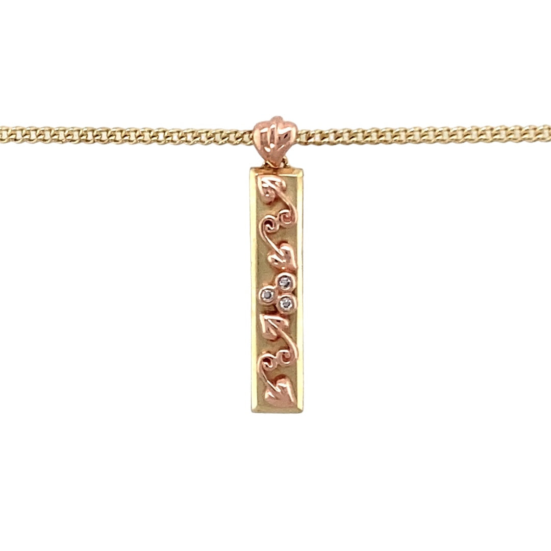 Preowned 9ct Yellow and Rose Gold & Diamond Set Clogau Tree of Life Ingot Pendant on an 18" Clogau curb chain with the weight 4.70 grams. The pendant is 2.3cm long including the bail