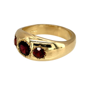 New 9ct Yellow Gold & Garnet Set Vintage Style Trilogy Ring in size Y with the weight 12.80 grams. The front of the ring is 11mm high and the center garnet stone is 6mm diameter