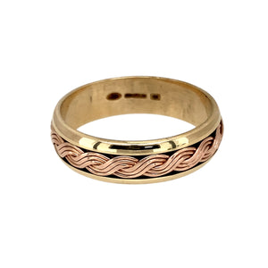 Add a touch of heritage and craftsmanship to your jewellery collection with this pre-owned 9ct yellow and rose Welsh gold plaited weave band ring, featuring:

Design: A beautifully intricate plaited weave pattern, symbolising unity and timeless elegance.
Material: 9-carat yellow and rose Welsh gold, creating a striking two-tone contrast.
Size & Weight: Designed in size Q, with a solid weight of 3.90 grams for a comfortable and durable feel.
Band Width: Measures 6mm wide, making it a bold yet refined piece.
