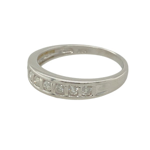 Add a touch of timeless elegance to your jewellery collection with this pre-owned 9ct white gold & diamond set band ring, featuring:

Design: A classic band-style ring, perfect for everyday wear or special occasions.
Material: 9-carat white gold, offering a sleek and polished finish.
Gemstone Detail: Set with approximately 0.25ct total diamond content, adding brilliance and sophistication.
Ring Width: The front of the band measures 4mm wide, creating a refined yet noticeable look.
