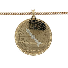 Load image into Gallery viewer, Add a unique and celestial-inspired piece to your jewellery collection with this pre-owned 9ct yellow and white gold star sign compass pendant necklace, featuring:

Design: A distinctive compass pendant with a movable needle that can be set to any of the 12 star signs, making it a meaningful and interactive piece.
Material: 9-carat yellow and white gold, providing a striking contrast and polished finish.
Pendant Size: Measures 4.4cm long including the bail, creating a bold and eye-catching statement.

