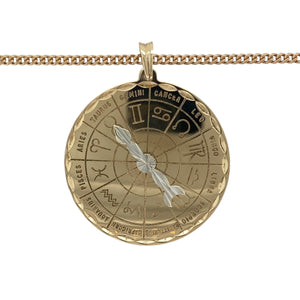 Add a unique and celestial-inspired piece to your jewellery collection with this pre-owned 9ct yellow and white gold star sign compass pendant necklace, featuring:

Design: A distinctive compass pendant with a movable needle that can be set to any of the 12 star signs, making it a meaningful and interactive piece.
Material: 9-carat yellow and white gold, providing a striking contrast and polished finish.
Pendant Size: Measures 4.4cm long including the bail, creating a bold and eye-catching statement.
