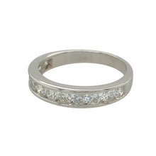 Load image into Gallery viewer, Add a touch of elegance and brilliance to your jewellery collection with this pre-owned 18ct white gold &amp; diamond set band ring, featuring:

Design: A timeless band-style ring, perfect for everyday sophistication or special occasions.
Material: 18-carat white gold, offering a sleek and polished finish.
Gemstone Detail: Set with approximately 0.48ct total diamond content, ensuring exceptional sparkle and refinement.
Ring Width: The front of the band measures 4mm wide, creating a bold yet elegant look.

