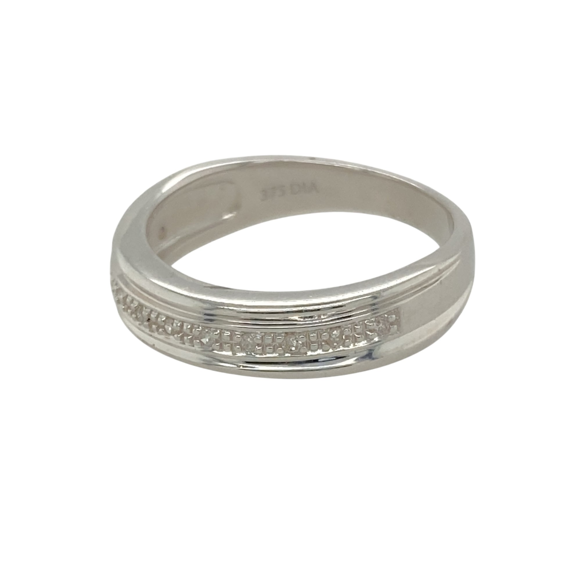 Add subtle sophistication to your jewellery collection with this pre-owned 9ct white gold and diamond set band ring, featuring:

Design: A sleek and modern band style with a refined silhouette, perfect for everyday wear or stacking with other pieces.
Material: Made from 9-carat white gold, offering a cool-toned, polished finish that complements any look.
Gemstone Detail: Set with sparkling diamonds that add a touch of brilliance and elegance to the band.

