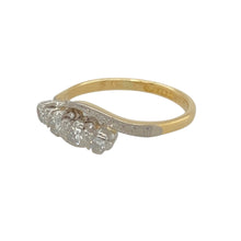 Load image into Gallery viewer, Add a distinctive touch to your jewellery collection with this pre-owned 18ct yellow gold and platinum diamond set twist ring, featuring:

Design: A graceful twist design that symbolises unity and flow, blending classic and contemporary style in one elegant form.
Material: Made from 18-carat yellow gold with platinum detailing, offering a luxurious contrast of warm and cool tones.
Gemstone Detail: Accented with sparkling diamonds that enhance the flowing lines of the twist with subtle brilliance.

