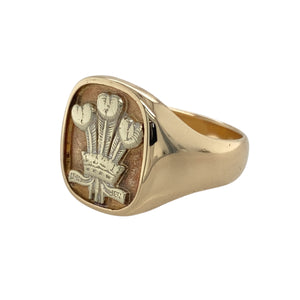 Add a touch of heritage and elegance to your jewellery collection with this pre-owned 9ct yellow and white gold Welsh Three Feathers signet ring.

Design: Featuring the iconic Welsh Three Feathers emblem, this signet ring combines yellow and white gold for a striking contrast and timeless appeal.
Material: Made from 9-carat yellow and white gold, offering a refined and polished finish that highlights the intricate design.
Size & Weight: The front of the ring is 16mm high, with a weight of 6.80 grams
