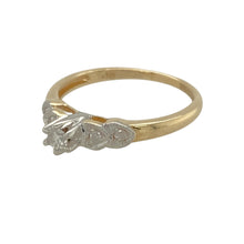 Load image into Gallery viewer, Add a touch of timeless elegance to your jewellery collection with this pre-owned 9ct yellow and white gold diamond set solitaire ring.

Design: A classic solitaire setting showcasing a brilliant-cut diamond, enhanced by the contrast of yellow and white gold for a sophisticated look.
Material: Made from 9-carat yellow and white gold, offering a refined and polished finish that highlights the diamond’s brilliance.
Diamond Detail: Features an approximately 0.10ct brilliant-cut diamond
