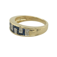 Load image into Gallery viewer, Add a unique and elegant touch to your jewellery collection with this pre-owned 9ct yellow and white gold diamond and sapphire set Greek key style band ring.

Design: Featuring a classic Greek key pattern, this band is enhanced with dazzling diamonds and deep blue sapphires for a timeless and sophisticated look.
Material: Made from a combination of 9-carat yellow and white gold, offering a striking contrast that highlights the intricate design.
Gemstone Detail: Set with sparkling diamonds and rich sapphire
