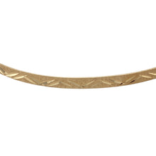 Load image into Gallery viewer, Add a touch of elegance to your jewellery collection with this pre-owned 9ct yellow solid gold patterned bangle.

Design: A beautifully patterned bangle, offering a subtle yet stylish texture for a refined and timeless look.
Material: Made from 9-carat yellow solid gold, providing a warm and polished finish that complements the intricate pattern.
Size &amp; Weight: Weighing 3.80 grams, the bangle has a width of 3mm and a diameter of 6.7cm, offering a comfortable and secure fit.

