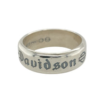 Load image into Gallery viewer, Add a bold statement to your jewellery collection with this pre-owned 925 silver Harley Davidson band ring.

Design: Featuring the iconic Harley Davidson design, this band ring embodies the spirit of adventure and strength with its rugged and stylish look.
Material: Crafted from high-quality 925 sterling silver, this ring offers durability and a polished finish that stands out.
Size &amp; Weight: Weighing 9.80 grams, the band is 8mm wide, offering a solid and comfortable fit in size U.

