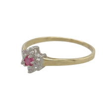 Load image into Gallery viewer, A delicate and elegant addition to any jewellery collection, this pre-owned 9ct yellow gold ring features a beautiful ruby and cubic zirconia flower cluster design.

Design: A floral-inspired cluster setting with a central ruby surrounded by sparkling cubic zirconias.
Material: Made from 9-carat yellow gold, offering a warm and polished finish.
Gemstone Detail: The center ruby stone has a 3mm diameter, with the front of the ring measuring 6mm high.

