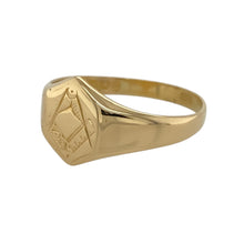 Load image into Gallery viewer, A bold and distinctive piece, this pre-owned 18ct yellow gold Masonic signet ring features a classic design with symbolic significance.

Design: A traditional signet ring with a Masonic symbol engraved on the front, representing unity, brotherhood, and tradition.
Material: Made from 18-carat yellow gold, offering a rich and polished finish.
Size &amp; Weight: Weighing 4.90 grams, this ring is size T, with the front of the ring measuring 12mm high for a striking and substantial look.
