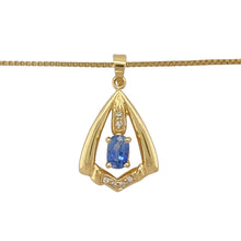 Load image into Gallery viewer, Add a touch of elegance to your jewellery collection with this pre-owned 18ct yellow gold diamond and sapphire set pendant on a 20&quot; box chain necklace.

Design: A sophisticated pendant featuring a vibrant sapphire, complemented by sparkling diamonds for a luxurious and refined look.
Material: Made from 18-carat yellow gold, offering a warm, polished finish that enhances the beauty of the gemstones.
Gemstone Detail: The sapphire measures 5mm by 3mm
