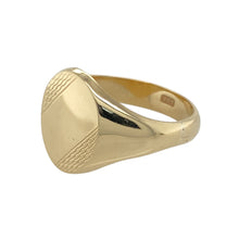 Load image into Gallery viewer, Add a refined and classic piece to your jewellery collection with this pre-owned 9ct yellow gold patterned oval signet ring.

Design: A timeless oval-shaped signet ring featuring intricate pattern detailing on the front, offering a bold yet elegant look.
Material: Made from 9-carat yellow gold, providing a warm, polished finish that enhances the ring’s design.
Size &amp; Weight: Weighing 5.70 grams, this ring is size R, with the front of the band measuring 14mm high for a striking presence.
