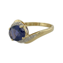 Load image into Gallery viewer, Add a touch of timeless elegance to your jewellery collection with this pre-owned 9ct yellow gold diamond &amp; sapphire set twist ring.

Design: A sophisticated twist design featuring a deep blue sapphire, accented by sparkling diamonds for a refined finish.
Material: Made from 9-carat yellow gold, offering a warm and polished setting that enhances the beauty of the gemstones.
Gemstone Detail: The oval-cut sapphire stone measures 9mm by 7mm, elegantly complemented by dazzling diamond accents.

