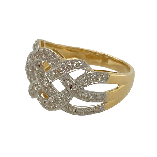 Add a touch of sophistication to your jewellery collection with this pre-owned 18ct yellow and white gold & diamond set open weave wide band ring.

Design: An intricate open weave design, elegantly enhanced by sparkling diamonds for a refined and luxurious look.
Material: Crafted from 18-carat yellow and white gold, creating a striking contrast that highlights the ring’s intricate detailing.
Gemstone Detail: Brilliant diamonds are set within the weave, adding a touch of sparkle to the design.
