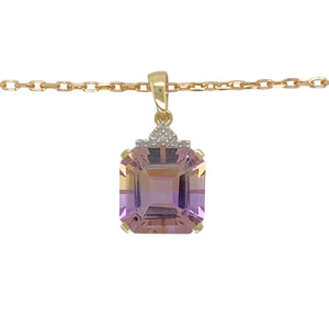 Add a unique statement to your jewellery collection with this pre-owned 9ct yellow gold diamond & ametrine set pendant necklace.

Design: A striking pendant showcasing a vibrant ametrine gemstone, accented by sparkling diamonds for added elegance.
Material: Made from 9-carat yellow gold, providing a warm and polished finish that enhances the beauty of the gemstones.
Gemstone Detail: The square-cut ametrine stone measures 12mm by 12mm
