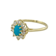 Load image into Gallery viewer, Add a pop of colour to your jewellery collection with this pre-owned 9ct yellow gold turquoise-coloured stone and cubic zirconia set cluster ring, featuring:

Design: A charming cluster setting with a vibrant turquoise-coloured centre stone surrounded by sparkling cubic zirconia for added brilliance.
Material: 9-carat yellow gold, offering a warm and polished finish that complements the vivid stone.
Gemstone Detail: Features a 6mm by 4mm turquoise-coloured stone at the centre
