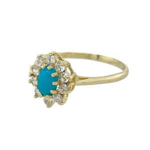 Add a pop of colour to your jewellery collection with this pre-owned 9ct yellow gold turquoise-coloured stone and cubic zirconia set cluster ring, featuring:

Design: A charming cluster setting with a vibrant turquoise-coloured centre stone surrounded by sparkling cubic zirconia for added brilliance.
Material: 9-carat yellow gold, offering a warm and polished finish that complements the vivid stone.
Gemstone Detail: Features a 6mm by 4mm turquoise-coloured stone at the centre