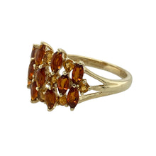 Load image into Gallery viewer, Brighten your jewellery collection with this pre-owned 9ct yellow gold cluster ring, featuring:

Design: A vibrant cluster style showcasing a mix of orange and yellow stones arranged in a lively and eye-catching formation.
Material: 9-carat yellow gold, offering a warm, classic finish that enhances the rich tones of the stones.
Gemstone Detail: Set with fiery orange and sunny yellow stones, adding a playful yet elegant burst of colour.
Ring Front: Measures 12mm high, creating a bold focal point with a cheer
