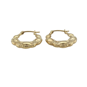 Add a playful twist to classic hoops with these pre-owned 9ct yellow gold bubble style creole earrings, featuring:

Design: A distinctive oval creole shape with a bubble-textured finish that catches the light for subtle sparkle and charm.
Material: 9-carat yellow gold, offering a warm, polished look with timeless appeal.
Style: The oval design adds a modern edge to a traditional silhouette, perfect for both everyday wear and special occasions.
