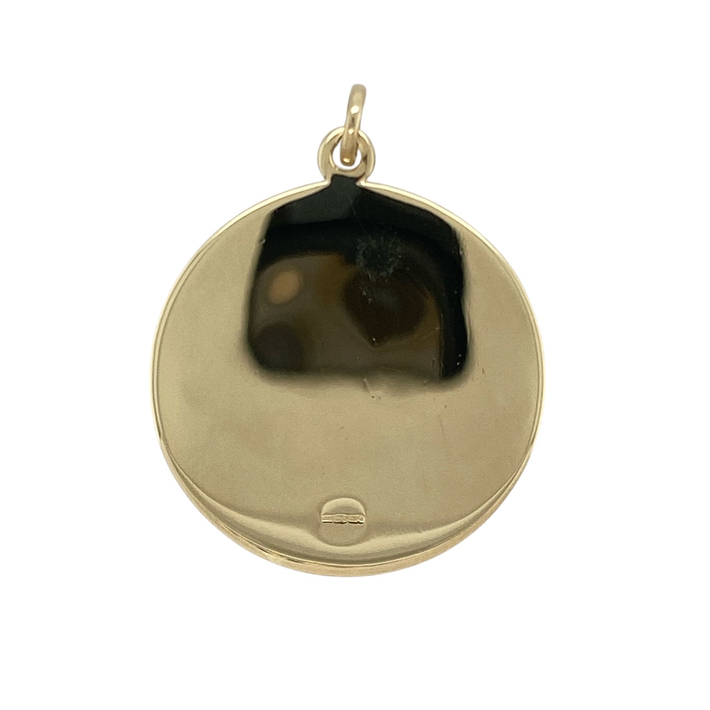 Carry a timeless symbol of protection and guidance with this pre-owned 9ct yellow gold round St Christopher pendant, featuring:

Design: A traditional round pendant showcasing a detailed image of St Christopher, the patron saint of travellers—symbolising safety and spiritual strength.
Material: 9-carat yellow gold, offering a rich, polished finish that enhances the intricate design.
Style: Bold and meaningful—ideal for wearing on a substantial chain or gifting as a cherished keepsake.
