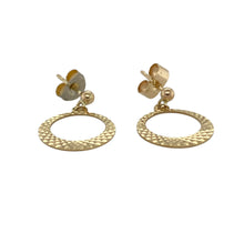 Load image into Gallery viewer, Add a subtle statement to your collection with these pre-owned 9ct yellow gold patterned open circle drop stud earrings, featuring:

Design: A modern open circle drop design with delicate pattern detailing, offering texture and movement in a refined silhouette.
Material: 9-carat yellow gold, providing a warm, polished finish that enhances the intricate design.
Style: Stud-backed drops that are lightweight and easy to wear—perfect for everyday elegance or adding a touch of interest to evening looks.

