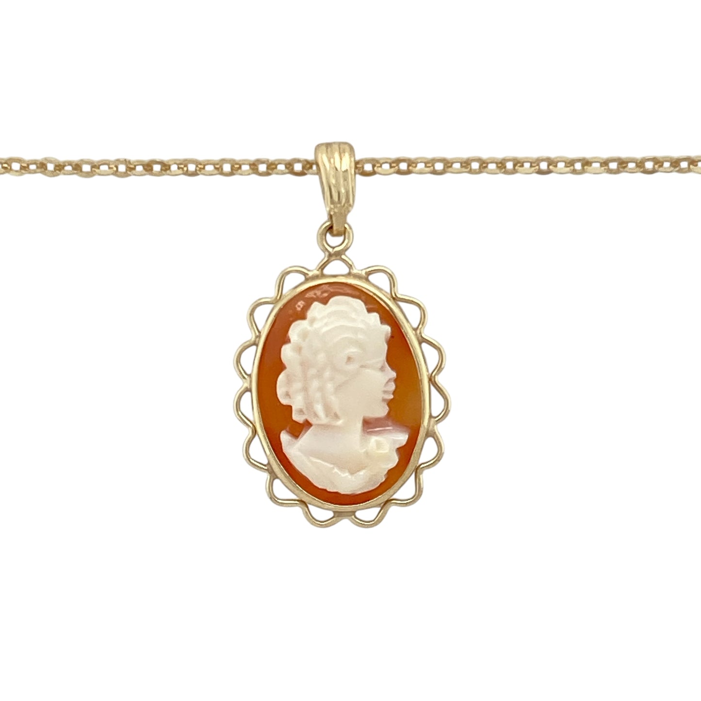 Add timeless vintage charm to your collection with this pre-owned 9ct yellow gold cameo pendant necklace, featuring:

Design: A beautifully carved traditional cameo set in a polished yellow gold frame, offering a classic and feminine silhouette with a nod to antique style.
Material: 9-carat yellow gold, providing a rich and refined setting that enhances the cameo’s delicate detail.
Gemstone Detail: Features a 16mm by 11mm oval cameo