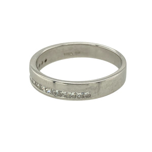 Add understated sparkle to your collection with this pre-owned 9ct white gold diamond set band ring, featuring:

Design: A sleek and modern band style set with shimmering diamonds across the front, offering subtle brilliance and timeless appeal.
Material: 9-carat white gold, polished to a bright finish that enhances the sparkle of the stones.
Gemstone Detail: Set with diamonds for a refined touch of luxury—perfect for everyday elegance or special occasions.
